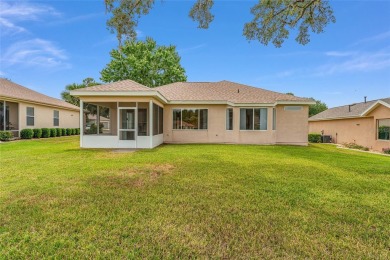 This furnished 2-bedroom, 2-bath home is located in the highly on Eagle Ridge At Spruce Creek Country Club in Florida - for sale on GolfHomes.com, golf home, golf lot