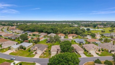This furnished 2-bedroom, 2-bath home is located in the highly on Eagle Ridge At Spruce Creek Country Club in Florida - for sale on GolfHomes.com, golf home, golf lot