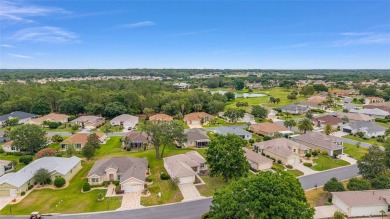 This furnished 2-bedroom, 2-bath home is located in the highly on Eagle Ridge At Spruce Creek Country Club in Florida - for sale on GolfHomes.com, golf home, golf lot
