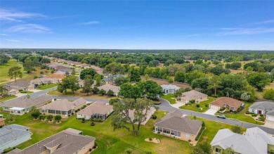 This furnished 2-bedroom, 2-bath home is located in the highly on Eagle Ridge At Spruce Creek Country Club in Florida - for sale on GolfHomes.com, golf home, golf lot