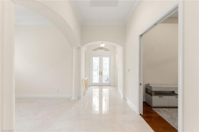 Step into your own slice of paradise in this beautifully updated on Vineyards Golf and Country Club in Florida - for sale on GolfHomes.com, golf home, golf lot