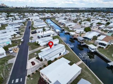 Welcome to 107 E Saint Johns Way in the Caribbean Isles on Apollo Beach Golf and Sea Club in Florida - for sale on GolfHomes.com, golf home, golf lot