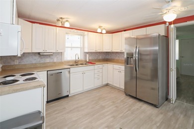 Welcome to 107 E Saint Johns Way in the Caribbean Isles on Apollo Beach Golf and Sea Club in Florida - for sale on GolfHomes.com, golf home, golf lot