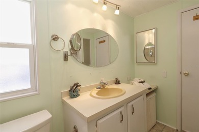 Welcome to 107 E Saint Johns Way in the Caribbean Isles on Apollo Beach Golf and Sea Club in Florida - for sale on GolfHomes.com, golf home, golf lot