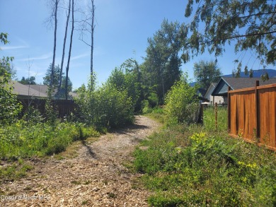 Charming 2-bedroom, 2-bath cottage nestled in a peaceful on Sandpoint Elks Golf Course in Idaho - for sale on GolfHomes.com, golf home, golf lot