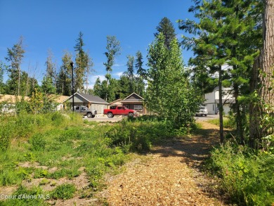 Charming 2-bedroom, 2-bath cottage nestled in a peaceful on Sandpoint Elks Golf Course in Idaho - for sale on GolfHomes.com, golf home, golf lot