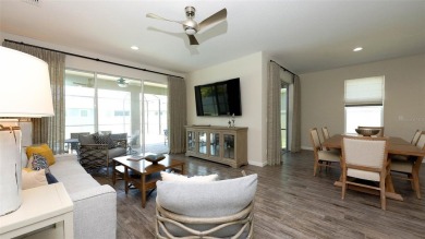PARTIALLY FURNISHED 3-BEDROOM, 2-BATH POOL HOME IN GATED on Esplanade Golf and Country at Lakewood Ranch in Florida - for sale on GolfHomes.com, golf home, golf lot