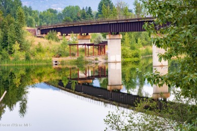 Charming 2-bedroom, 2-bath cottage nestled in a peaceful on Sandpoint Elks Golf Course in Idaho - for sale on GolfHomes.com, golf home, golf lot