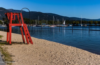 Charming 2-bedroom, 2-bath cottage nestled in a peaceful on Sandpoint Elks Golf Course in Idaho - for sale on GolfHomes.com, golf home, golf lot