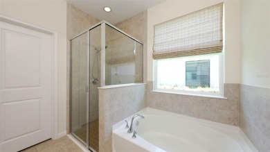 PARTIALLY FURNISHED 3-BEDROOM, 2-BATH POOL HOME IN GATED on Esplanade Golf and Country at Lakewood Ranch in Florida - for sale on GolfHomes.com, golf home, golf lot