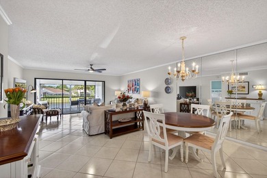 Beautifully updated 2-bedroom, 2-bath second-floor condo on Old Marsh Golf Club in Florida - for sale on GolfHomes.com, golf home, golf lot
