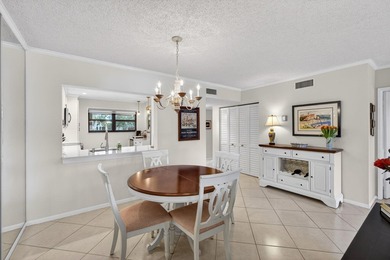 Beautifully updated 2-bedroom, 2-bath second-floor condo on Old Marsh Golf Club in Florida - for sale on GolfHomes.com, golf home, golf lot