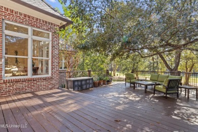 This gorgeous, custom home in the high demand  Oaks of Pass on The Oaks Golf Club in Mississippi - for sale on GolfHomes.com, golf home, golf lot