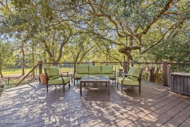 This gorgeous, custom home in the high demand  Oaks of Pass on The Oaks Golf Club in Mississippi - for sale on GolfHomes.com, golf home, golf lot