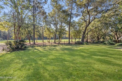 This gorgeous, custom home in the high demand  Oaks of Pass on The Oaks Golf Club in Mississippi - for sale on GolfHomes.com, golf home, golf lot