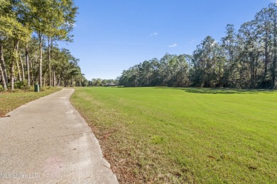 This gorgeous, custom home in the high demand  Oaks of Pass on The Oaks Golf Club in Mississippi - for sale on GolfHomes.com, golf home, golf lot