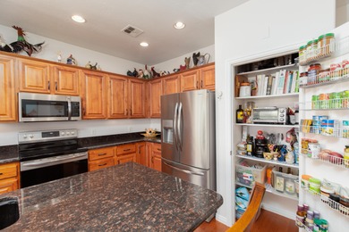 Beautifully situated high above the neighborhood, this 4-bedroom on Coral Canyon Golf Course in Utah - for sale on GolfHomes.com, golf home, golf lot