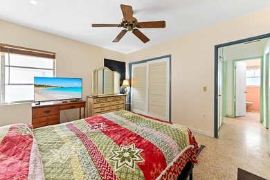 Single-family home located in the Historic District of Lake on Lake Worth Municipal Golf Course in Florida - for sale on GolfHomes.com, golf home, golf lot