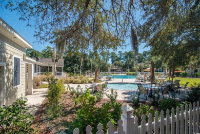 Experience the charm of this cozy townhome, tucked beneath the on Wachesaw Plantation Club in South Carolina - for sale on GolfHomes.com, golf home, golf lot
