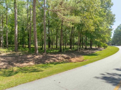 Nestled amidst the tranquil beauty of the prestigious Jack on Great Waters Course At Reynolds Plantation in Georgia - for sale on GolfHomes.com, golf home, golf lot