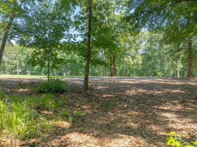 Nestled amidst the tranquil beauty of the prestigious Jack on Great Waters Course At Reynolds Plantation in Georgia - for sale on GolfHomes.com, golf home, golf lot