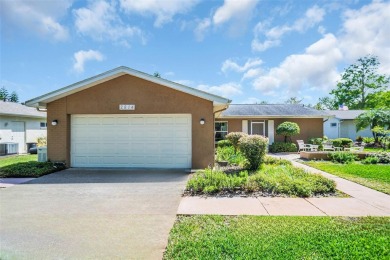 This beautifully updated home is a true gem in Highland Lakes on Highland Lakes Executive Golf Course in Florida - for sale on GolfHomes.com, golf home, golf lot