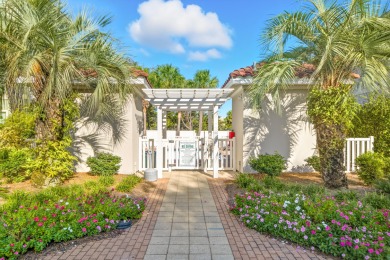 Located less than a quarter mile from the sugar-white sands of on Seascape Golf Course in Florida - for sale on GolfHomes.com, golf home, golf lot