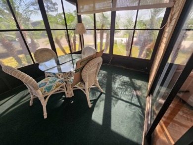 This home is on leased land in Cypress Lakes Village (a 55+ on Big Cypress Golf and Country Club in Florida - for sale on GolfHomes.com, golf home, golf lot