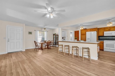 This beautifully updated home is a true gem in Highland Lakes on Highland Lakes Executive Golf Course in Florida - for sale on GolfHomes.com, golf home, golf lot