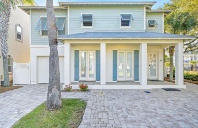 Located less than a quarter mile from the sugar-white sands of on Seascape Golf Course in Florida - for sale on GolfHomes.com, golf home, golf lot