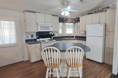 Under contract-accepting backup offerse take a tour of this on Polo Park East in Florida - for sale on GolfHomes.com, golf home, golf lot