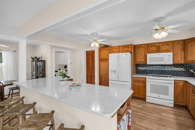 This beautifully updated home is a true gem in Highland Lakes on Highland Lakes Executive Golf Course in Florida - for sale on GolfHomes.com, golf home, golf lot