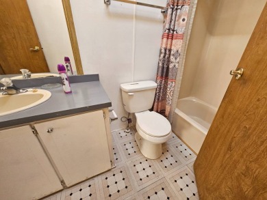 This home is on leased land in Cypress Lakes Village (a 55+ on Big Cypress Golf and Country Club in Florida - for sale on GolfHomes.com, golf home, golf lot