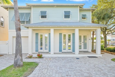 Located less than a quarter mile from the sugar-white sands of on Seascape Golf Course in Florida - for sale on GolfHomes.com, golf home, golf lot