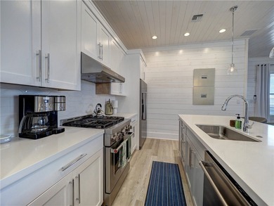 Adorable home on a corner lot in the Nautilus Subdivision. This on Palmilla Beach Golf Club in Texas - for sale on GolfHomes.com, golf home, golf lot