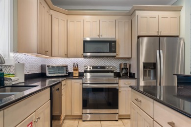 Located less than a quarter mile from the sugar-white sands of on Seascape Golf Course in Florida - for sale on GolfHomes.com, golf home, golf lot