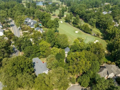 Set on a sprawling .95-acre lot, 7201 North Ridge Drive offers on North Ridge Country Club in North Carolina - for sale on GolfHomes.com, golf home, golf lot