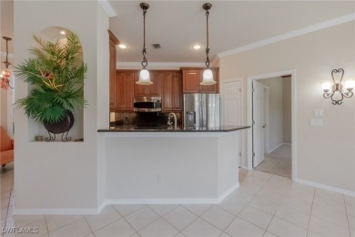 Pristine, remodeled, and ready for you... this Ibis II pool home on Herons Glen Golf and Country Club in Florida - for sale on GolfHomes.com, golf home, golf lot