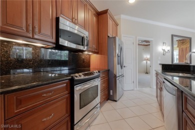 Pristine, remodeled, and ready for you... this Ibis II pool home on Herons Glen Golf and Country Club in Florida - for sale on GolfHomes.com, golf home, golf lot
