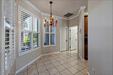 Pristine, remodeled, and ready for you... this Ibis II pool home on Herons Glen Golf and Country Club in Florida - for sale on GolfHomes.com, golf home, golf lot