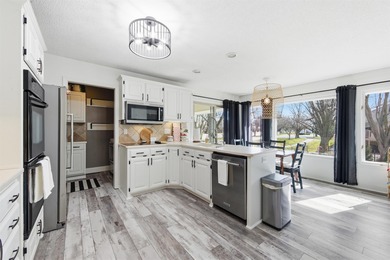 Spectacular, totally updated Reflection Ridge ranch with a on Reflection Ridge Golf Club in Kansas - for sale on GolfHomes.com, golf home, golf lot