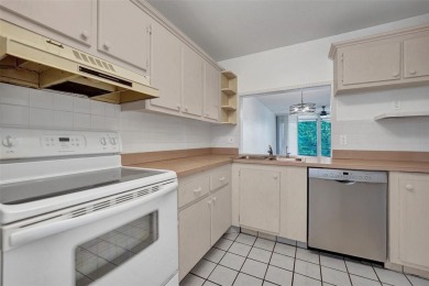 Experience resort-style living in this spacious 2-bedroom on Pine Island Ridge Country Club in Florida - for sale on GolfHomes.com, golf home, golf lot