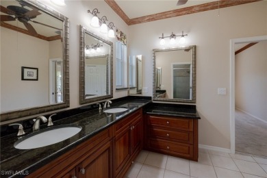Pristine, remodeled, and ready for you... this Ibis II pool home on Herons Glen Golf and Country Club in Florida - for sale on GolfHomes.com, golf home, golf lot