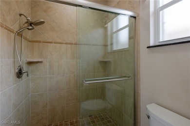 Pristine, remodeled, and ready for you... this Ibis II pool home on Herons Glen Golf and Country Club in Florida - for sale on GolfHomes.com, golf home, golf lot