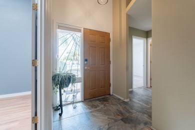 Welcome to this meticulously updated home in the Cove, located on Voyager RV Resort and Golf Course in Arizona - for sale on GolfHomes.com, golf home, golf lot
