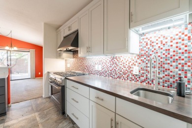 Welcome to this meticulously updated home in the Cove, located on Voyager RV Resort and Golf Course in Arizona - for sale on GolfHomes.com, golf home, golf lot