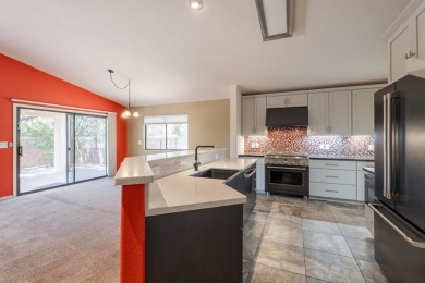 Welcome to this meticulously updated home in the Cove, located on Voyager RV Resort and Golf Course in Arizona - for sale on GolfHomes.com, golf home, golf lot