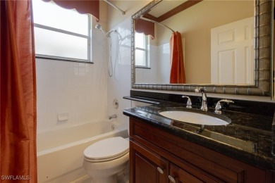 Pristine, remodeled, and ready for you... this Ibis II pool home on Herons Glen Golf and Country Club in Florida - for sale on GolfHomes.com, golf home, golf lot