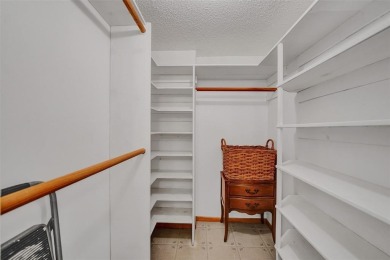 Experience resort-style living in this spacious 2-bedroom on Pine Island Ridge Country Club in Florida - for sale on GolfHomes.com, golf home, golf lot
