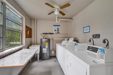 Experience resort-style living in this spacious 2-bedroom on Pine Island Ridge Country Club in Florida - for sale on GolfHomes.com, golf home, golf lot